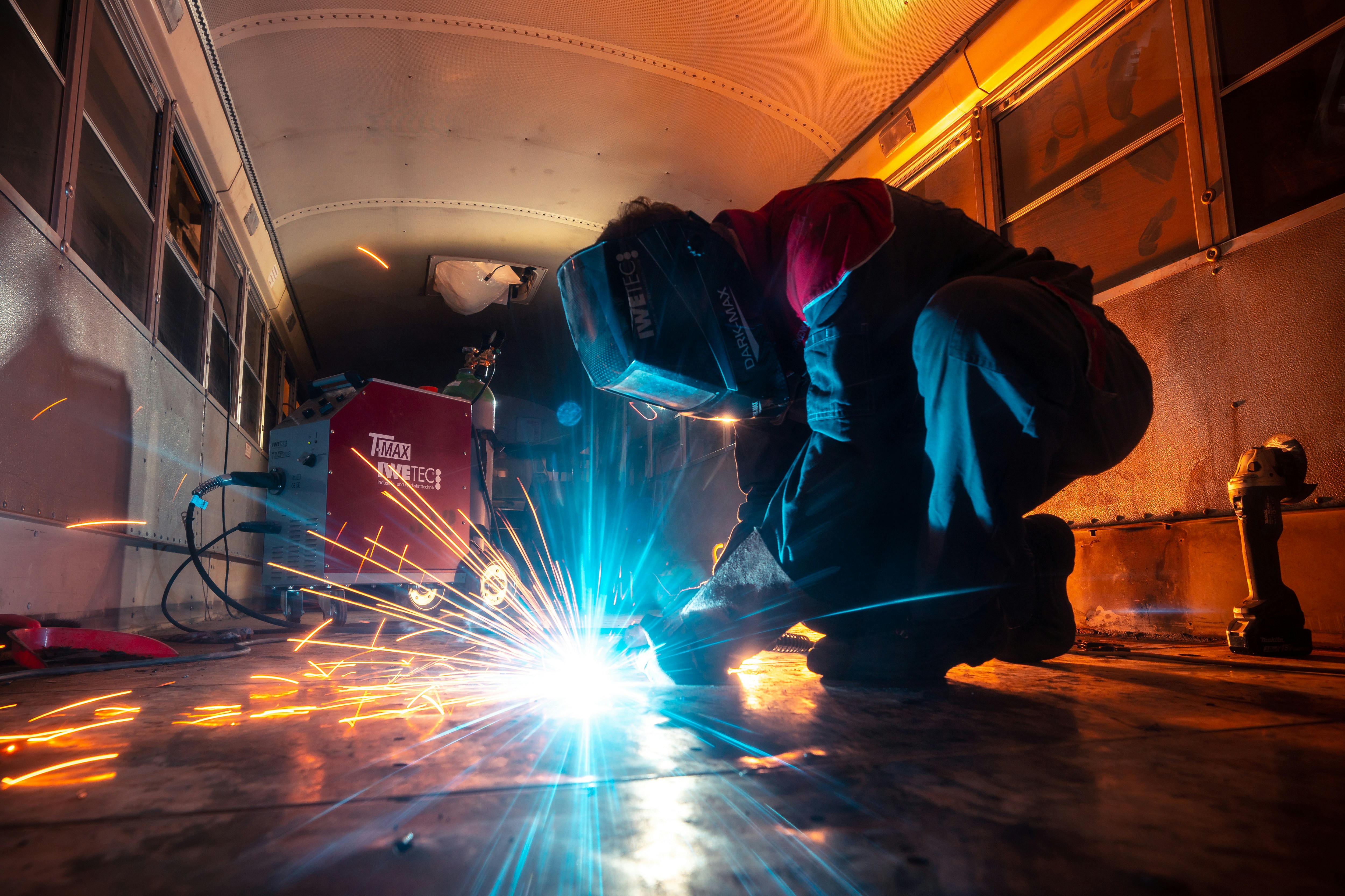 Professional welder performing industrial welding work
